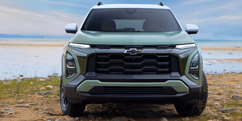 2025 Chevrolet Equinox SUV front view parked near lake