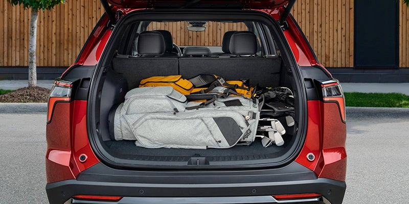 Rear cargo space 2025 Chevrolet Equinox with golf bags loaded